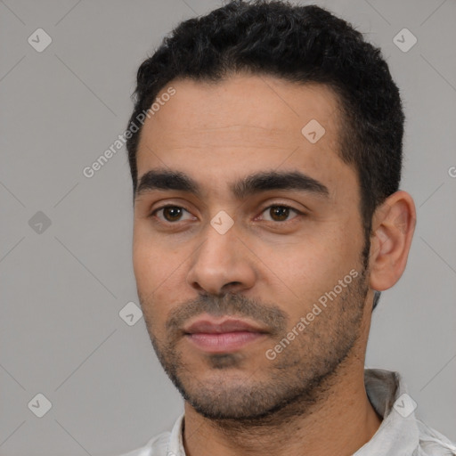 Neutral latino young-adult male with short  black hair and brown eyes