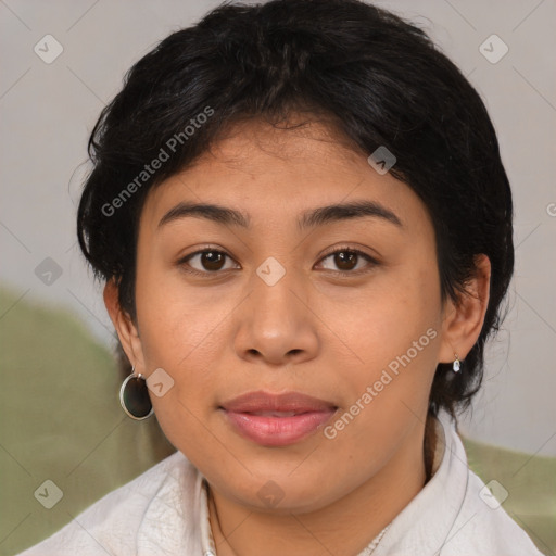 Joyful latino young-adult female with medium  brown hair and brown eyes