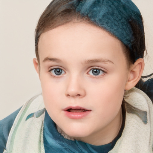 Neutral white child female with short  brown hair and blue eyes