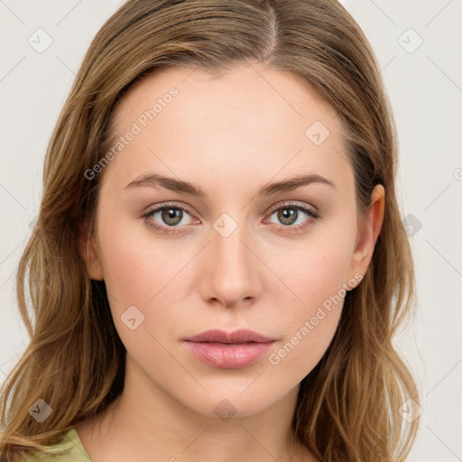 Neutral white young-adult female with long  brown hair and green eyes