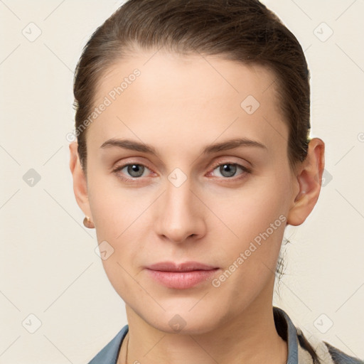 Neutral white young-adult female with short  brown hair and brown eyes