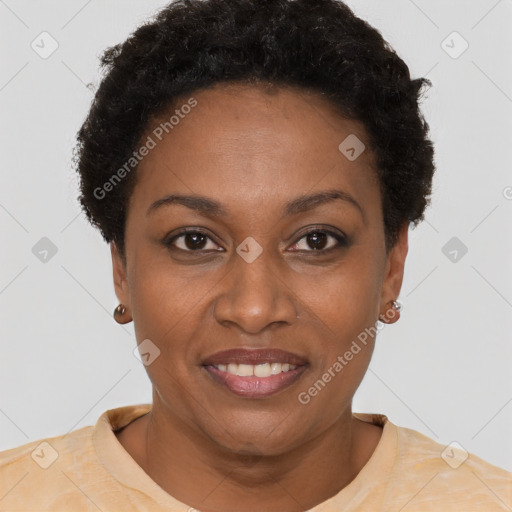 Joyful black young-adult female with short  brown hair and brown eyes