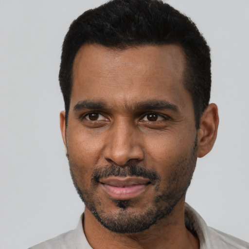 Neutral black adult male with short  black hair and brown eyes