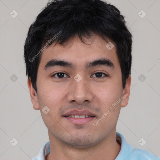 Joyful white young-adult male with short  black hair and brown eyes