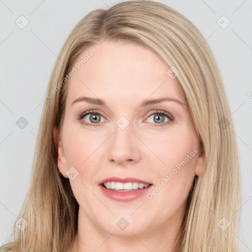 Joyful white young-adult female with long  brown hair and blue eyes