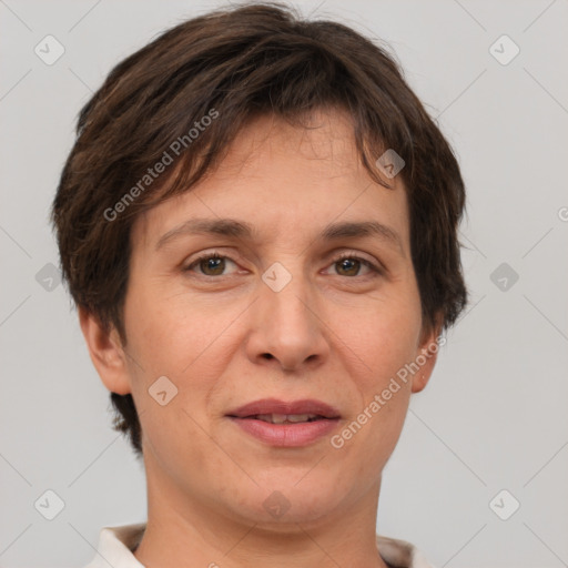 Joyful white adult female with short  brown hair and brown eyes