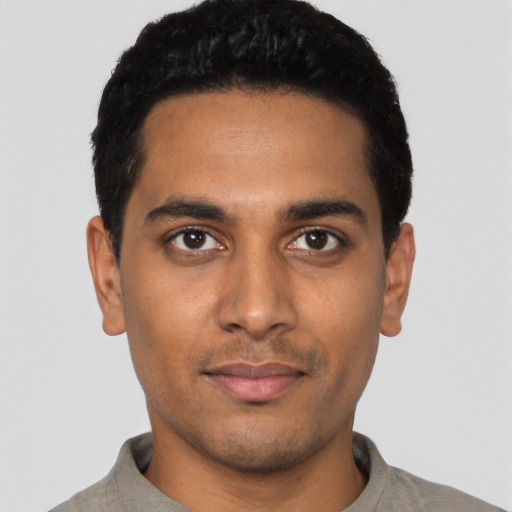 Neutral latino young-adult male with short  black hair and brown eyes