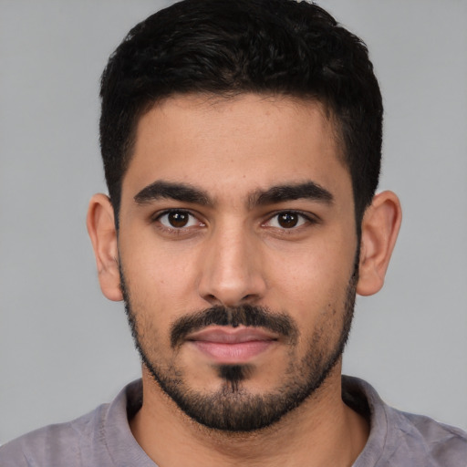 Neutral white young-adult male with short  black hair and brown eyes