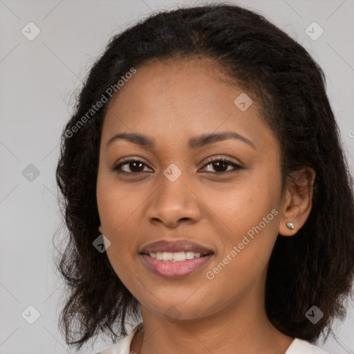 Joyful latino young-adult female with medium  brown hair and brown eyes