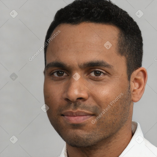 Neutral black young-adult male with short  black hair and brown eyes