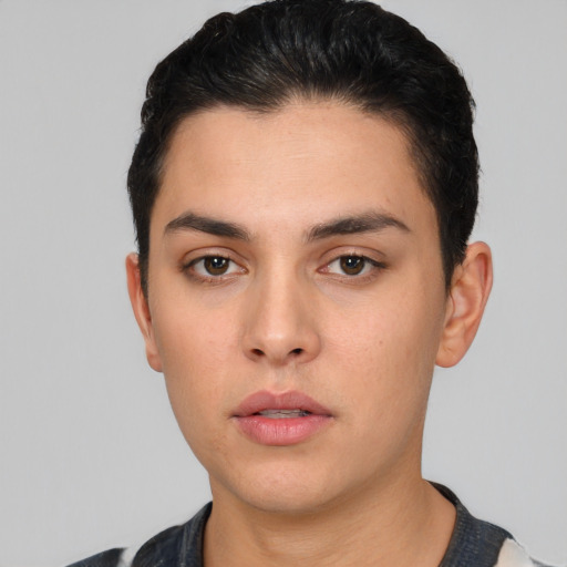 Neutral white young-adult male with short  black hair and brown eyes
