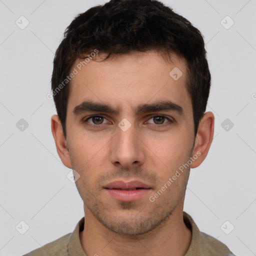 Neutral white young-adult male with short  brown hair and brown eyes