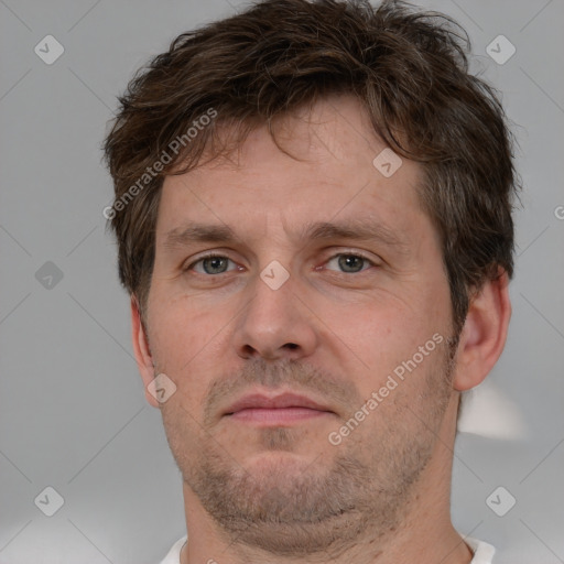 Neutral white adult male with short  brown hair and brown eyes