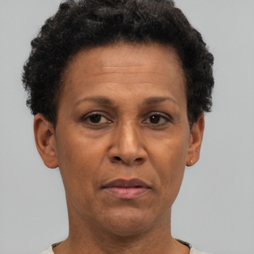Neutral black adult female with short  brown hair and brown eyes