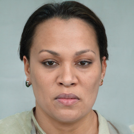 Joyful white adult female with short  brown hair and brown eyes