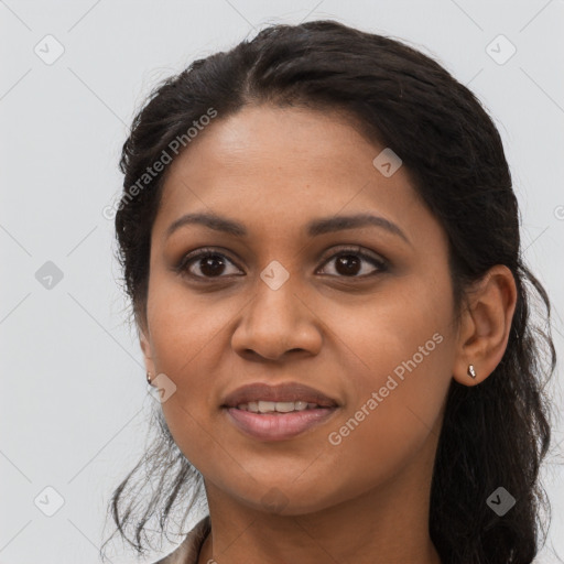 Joyful latino young-adult female with long  brown hair and brown eyes