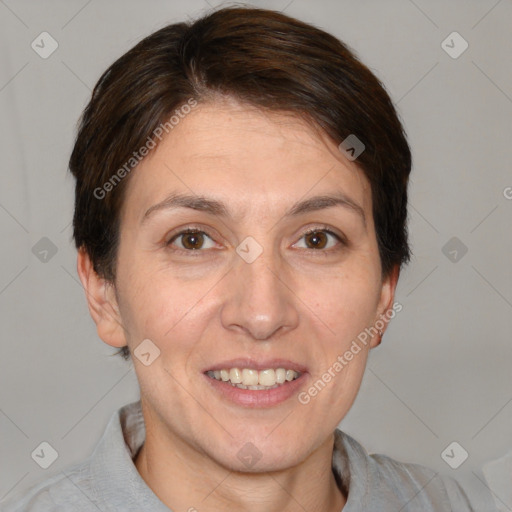 Joyful white adult female with short  brown hair and brown eyes