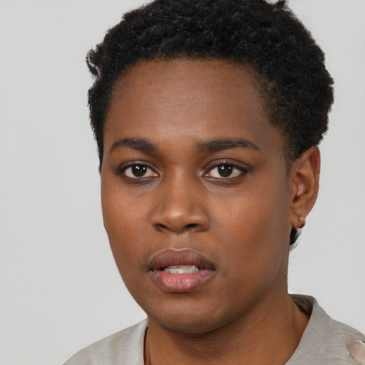 Neutral black young-adult female with short  black hair and brown eyes