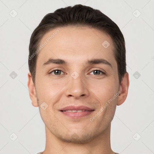 Joyful white young-adult male with short  brown hair and brown eyes