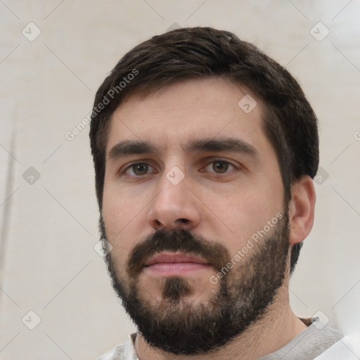 Neutral white young-adult male with short  black hair and brown eyes