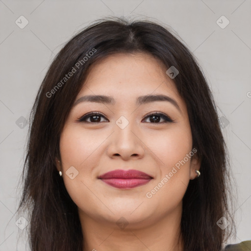 Joyful latino young-adult female with long  brown hair and brown eyes