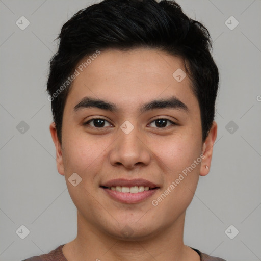 Joyful asian young-adult male with short  brown hair and brown eyes