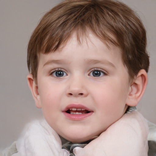 Joyful white child male with medium  brown hair and blue eyes