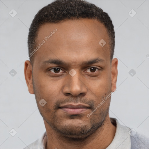 Neutral latino young-adult male with short  brown hair and brown eyes