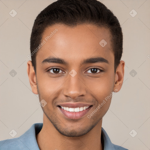 Joyful black young-adult male with short  brown hair and brown eyes