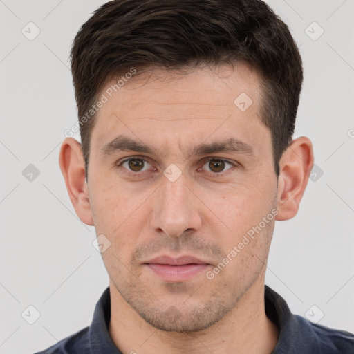 Neutral white adult male with short  brown hair and brown eyes