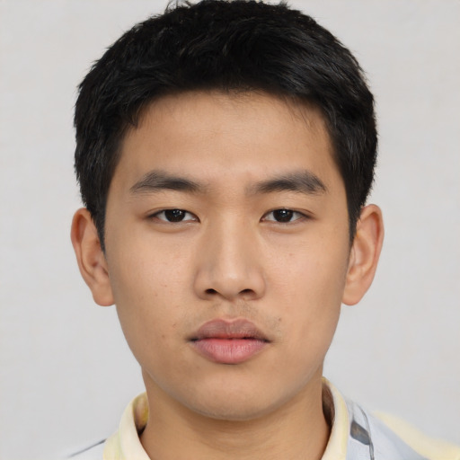 Neutral asian young-adult male with short  black hair and brown eyes