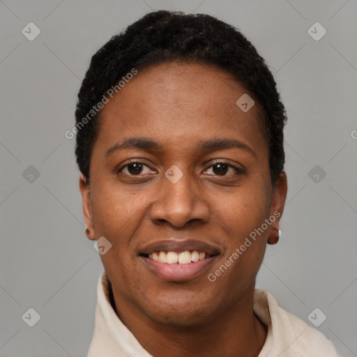 Joyful black young-adult female with short  black hair and brown eyes