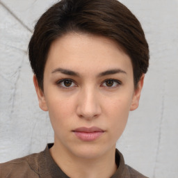 Neutral white young-adult female with short  brown hair and brown eyes