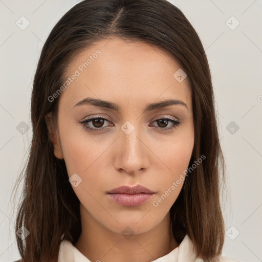 Neutral white young-adult female with long  brown hair and brown eyes