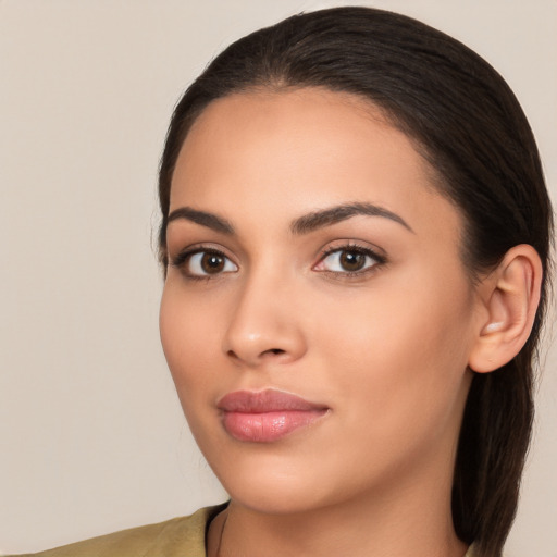 Neutral white young-adult female with long  brown hair and brown eyes