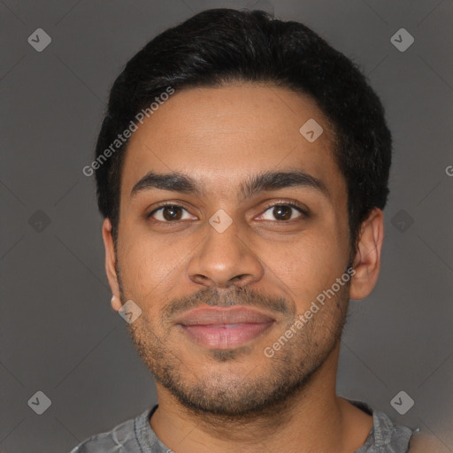 Joyful latino young-adult male with short  black hair and brown eyes