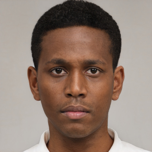Neutral black young-adult male with short  brown hair and brown eyes