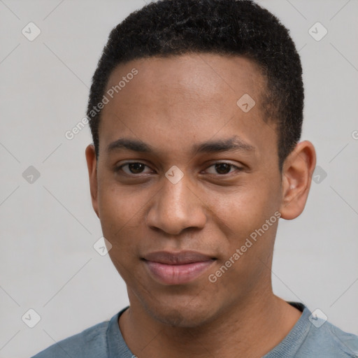 Joyful black young-adult male with short  brown hair and brown eyes