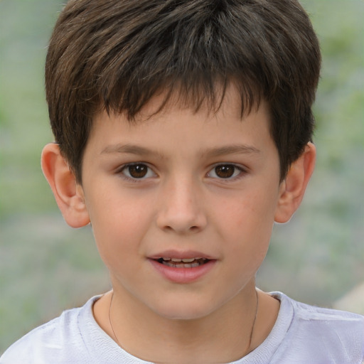 Joyful white child male with short  brown hair and brown eyes