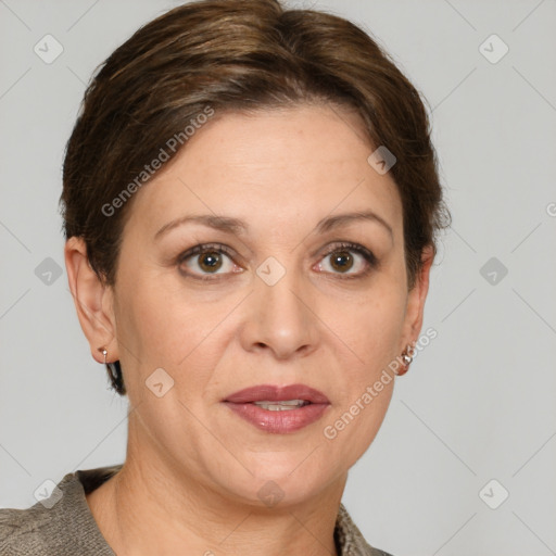 Joyful white adult female with short  brown hair and grey eyes