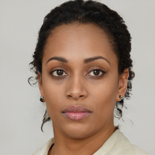 Neutral black young-adult female with long  black hair and brown eyes
