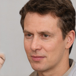 Neutral white adult male with short  brown hair and brown eyes