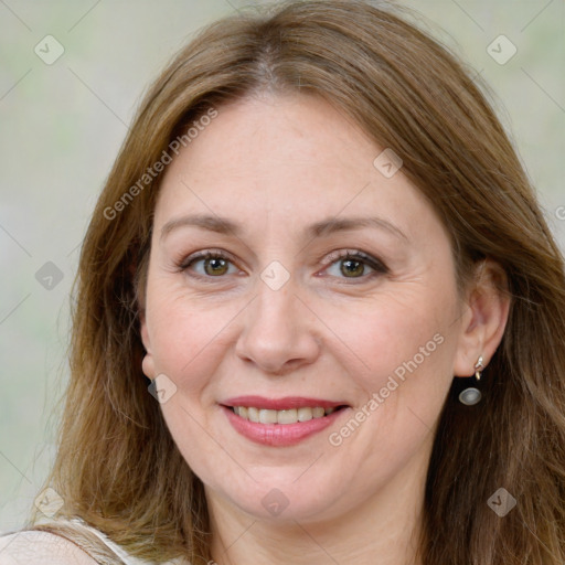 Joyful white adult female with medium  brown hair and grey eyes