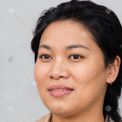 Joyful asian young-adult female with medium  brown hair and brown eyes