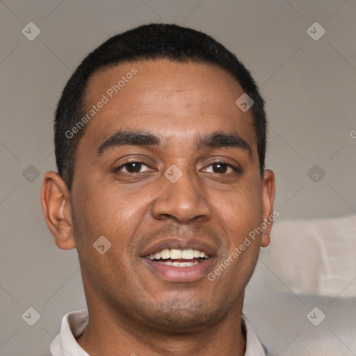 Joyful black young-adult male with short  black hair and brown eyes