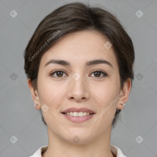 Joyful white young-adult female with medium  brown hair and brown eyes