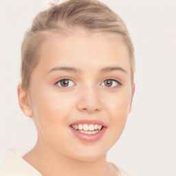 Joyful white child female with short  brown hair and brown eyes