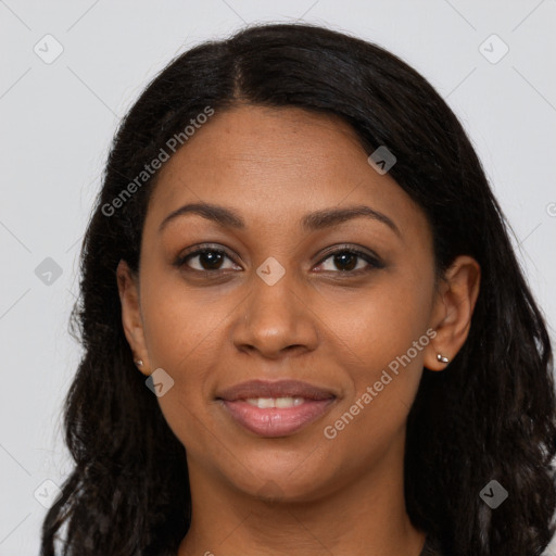 Joyful latino young-adult female with long  brown hair and brown eyes