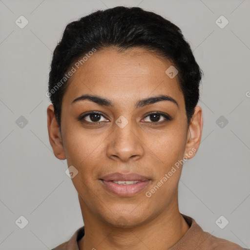 Joyful latino young-adult female with short  black hair and brown eyes