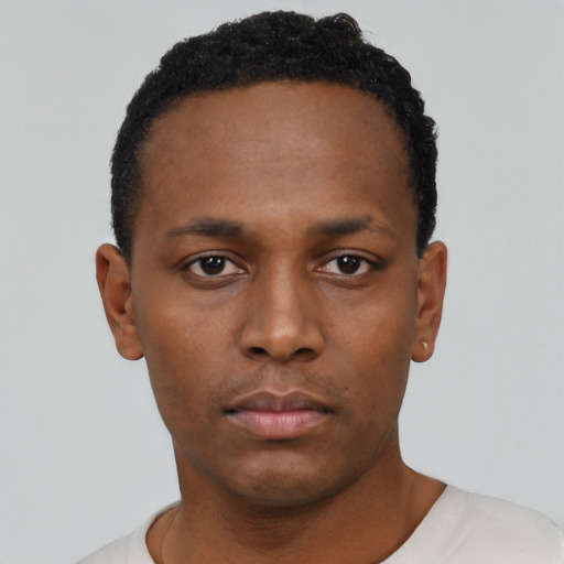 Neutral black young-adult male with short  black hair and brown eyes